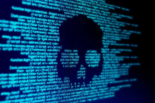 Imagen pantalla con código y calavera